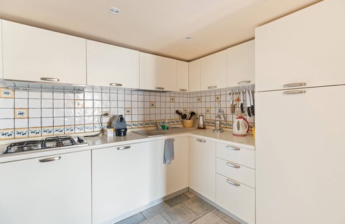 Bosa Historic Centre Apartment | Apartment 'Color Sabbia' with Balcony, Wi-Fi and Air Conditioning