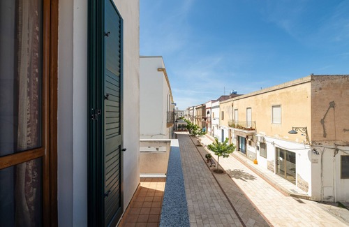 Calasetta Apartment | Apartment 'Da Giò, A Due Passi Dal Mare' with Private Terrace and Air Conditioning