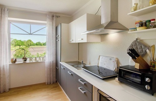 Idafehn Apartment | Apartment 'Familienfreundliche Unterkunft' with Shared Terrace, Private Garden and Wi-Fi