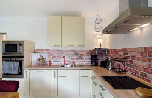 Norden Apartment | Apartment 'Ferienhaus Sonnenschein - Wohnung 2' with Private Terrace, Private Garden and Wi-Fi