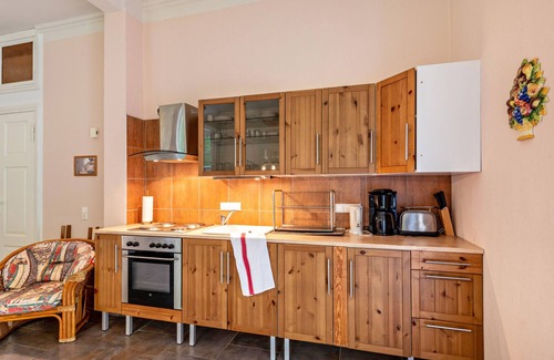 Krakow am See Apartment | Apartment 'Ferienwohnung 10 - Barrierefrei' with Private Terrace and Shared Garden