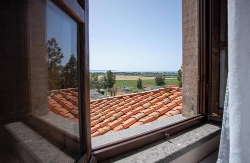 Riotorto Apartment | Apartment Giglio with Sea View, Pool, Wi-Fi, A/C & Garden