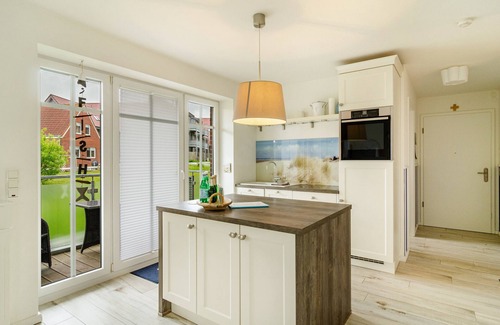 Baltrum Apartment | Apartment "Hus Wittdün Deck 1 Baltrum" with Balcony & Wi-Fi