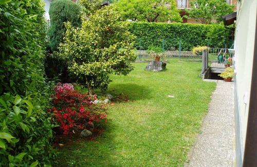 Dongo Apartment | Apartment in semi-detached house with large garden near the lake