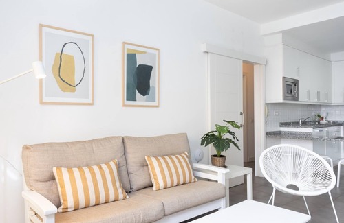 Poris de Abona Apartment | Apartment on the beach, work area and private parking - PillowAbroad