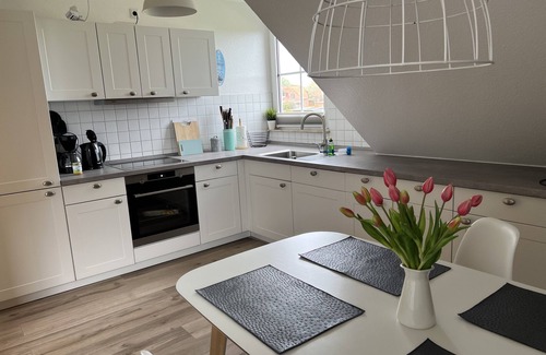 Petersdorf Apartment | Apartment with 3 bedrooms, balcony and fireplace - perfect for couples/families
