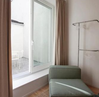 Postel Apartment | Apartment with City View in Saint-Gilles, 80 m²