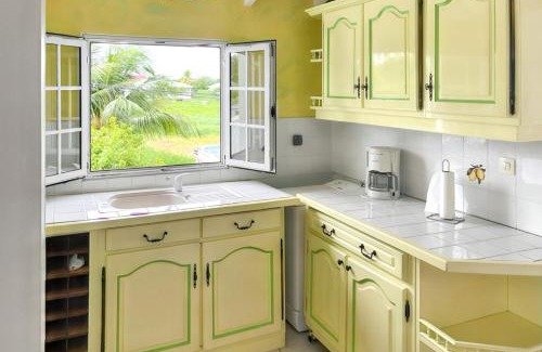 Damencourt Apartment | Appartement convivial au Moule avec jardin clôturé