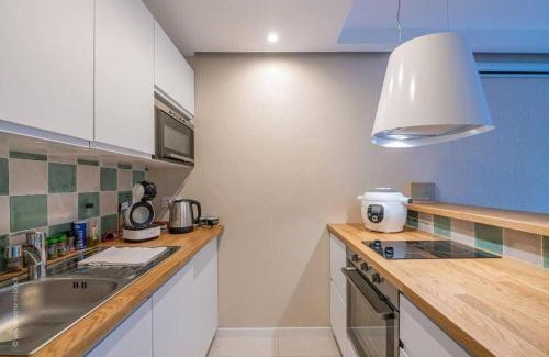 Combat Apartment | Appartement design avec jardin privatif