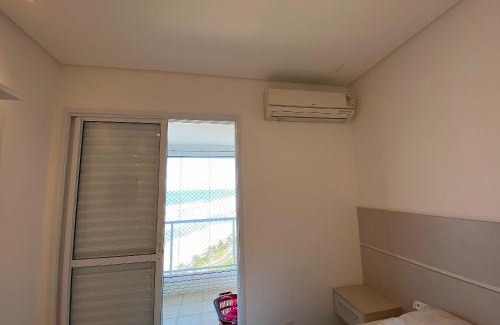 Mirim House | Apto Alto Padrão Frente Mar no melhor condomínio