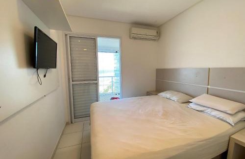 Mirim House | Apto Alto Padrão Frente Mar no melhor condomínio