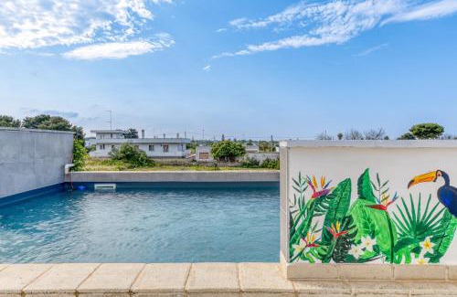 Marina di Mancaversa Apartment | Attico Vinci con piscina