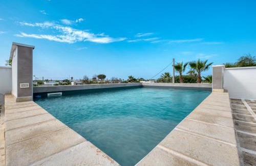 Marina di Mancaversa Apartment | Attico Vinci con piscina