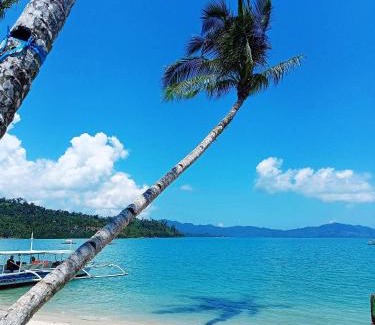Port Barton Resort | Ausan Beach Front Cottages