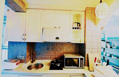 Futian Apartment | Avatar Green Queen Round Bed High Rise View Futian