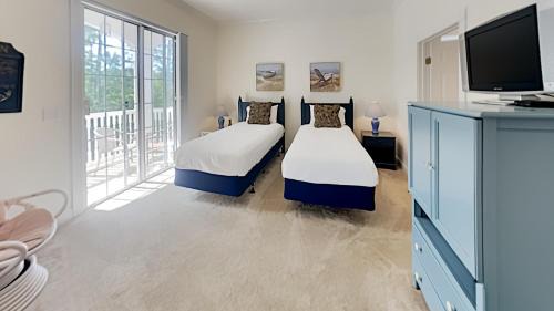 North Litchfield Beach Villa | Avian Forest Oasis Your Gateway to Golf Beach and Resort Living
