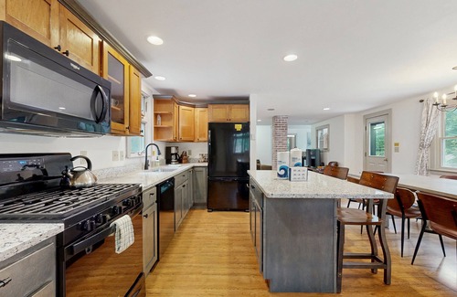 Sunday River Area Ski Chalet | Awesome mountain chalet with a hot tub, fire pit, and room for the whole family