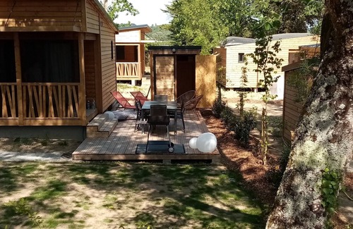 Guerande Ski Chalet | B032 3-bedroom wooden chalet on secure estate with covered swimming pool.