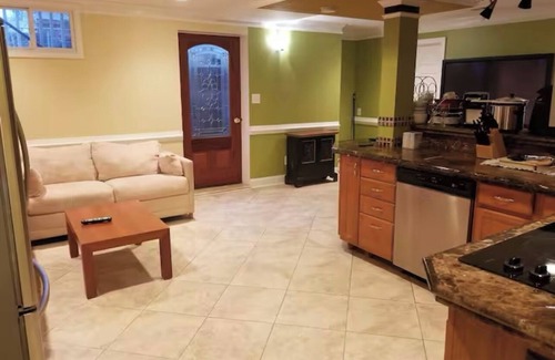 Vienna House | Basement Apartment in Home