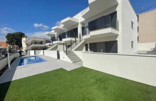 Santiago de la Ribera Apartment | Beach bungalow with swiming pool and long terrace