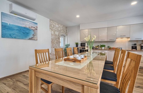 Vinisce Villa | Beach House Joy - charming waterfront villa with a heated pool for 8 guests