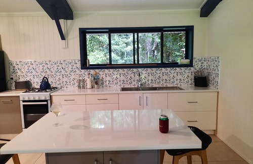 Thornton Beach House | beach over road, rainforest, cassowary, goanna , beach cafe, king bed , air con