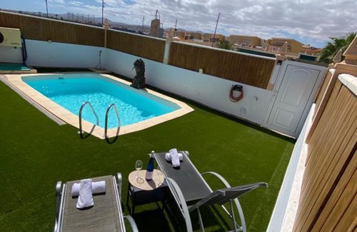 Caleta de Fuste Villa | Beach Villa private heated pool