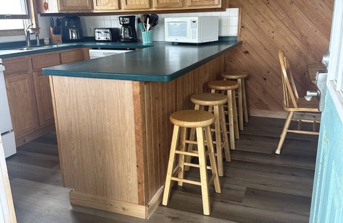 South Nags Head Cottage | Beachfront 3-bedroom cottage just steps to Outer Banks Beaches