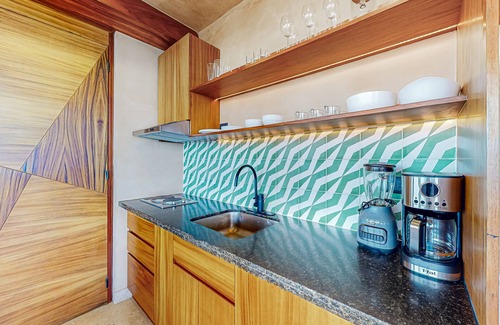 Tulsayab Apartment | Beachfront apt on the beach with community pools, kitchenette, AC, hammock