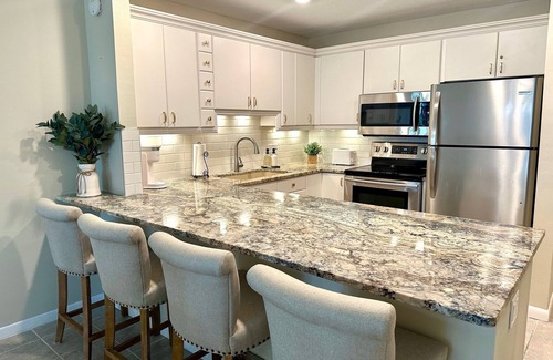 Ilexhurst Condo | Beachfront.Island Beach Club - Gorgeous First Floor 2 Bed, 2 bath with Pool