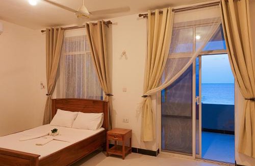 Uroa Apartment | Beachfront Zanzibar Escape 2BR Suites with Balcony WiFi, Uroa