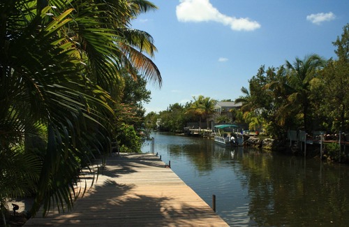 Breezeswept Beach Estates House | Beautiful 3 bedroom 2 bath canal front home with excellent boating!!