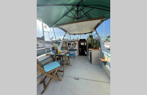 Sant Adria de Besos Boat Rental | Beautiful 70s vintage yacht boat in Barcelona