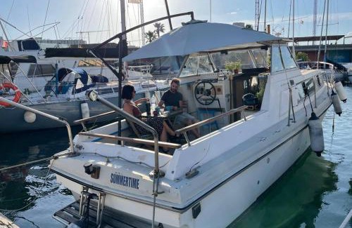 Sant Adria de Besos Boat Rental | Beautiful 70s vintage yacht boat in Barcelona