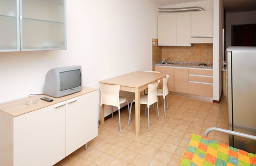Lignano Sabbiadoro Apartment | Beautiful apartment for 4 people with pool, A/C, TV, terrace, pets allowed and parking
