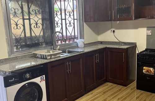 Freetown Apartment | Beautiful and spacious three bedroom apartment, 10 minutes walk to the beach