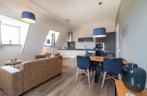 Colijnsplaat Apartment | Beautiful apartment for 4 guests with hot tub, WIFI, TV and balcony