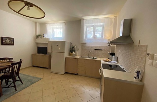 Stoupa Apartment | Beautiful Basement Apartment with Private Terrace