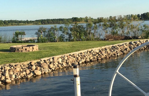 Alexandria House | Beautiful cabin with level lot on Maple Lake. Sunset views on the point!