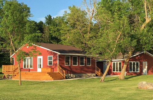 Alexandria House | Beautiful cabin with level lot on Maple Lake. Sunset views on the point!