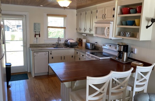 West Dennis House | BEAUTIFUL DUPLEX COTTAGE with OCEAN VIEWS of PRIVATE BEACH -