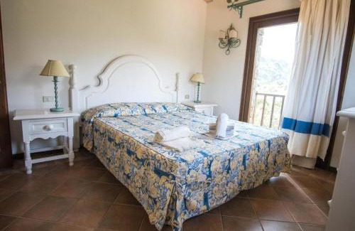 Liscia di Vacca Apartment | Beautiful Giardino degli Oleandri 2 Bedroom Apt sleeps 6 child