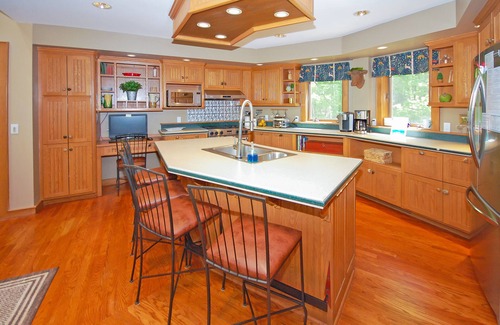 Empire House | Beautiful home on Little Glen Lake with a pool table, dock, fireplace, AC