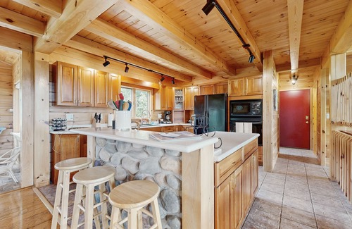 Dundee House | Beautiful lake view home with decks, grill, soaking tub & fireplace
