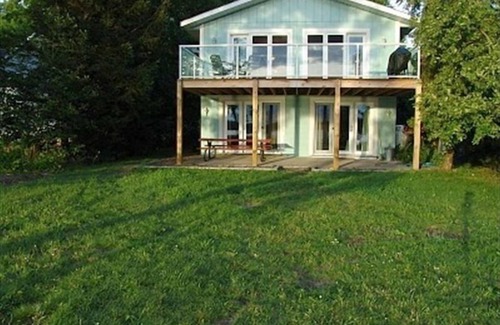 Arcadia House | Beautiful Lakefront Home, Central AC, Paddle to Lake Michigan, Dock, Beach, Raft