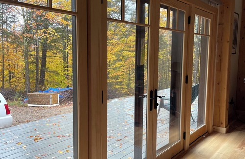 Bread Loaf House | Beautiful new two-bedroom timberframe house on 7 acres in Ripton.