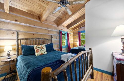 Marshall House | Beautiful Rustic Cabin Surrounded by Nature with Incredible Views and a Wrap-Around Deck for an Amazing Glamping Experience in Marshall, NC