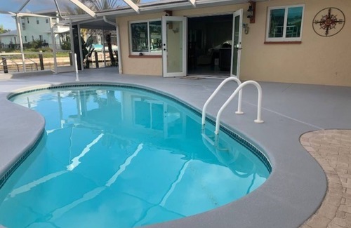 Saint James City House | BEAUTIFUL WATERFRONT HOME WITH SALTWATER POOL AND CANAL ACCESS