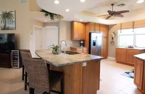 Pelican House | Beautifully maintained 4 bed/2 bath on canal w/pool & sailboat access