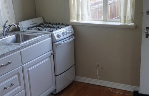 City Park West Apartment | Beautifully Remodeled, private w/walkout to back yard with air conditioning.